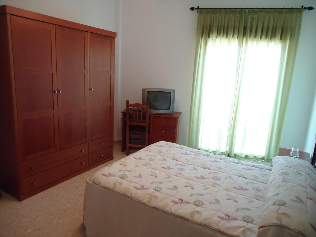 Hostal Los Claveles Баэна Номер фото